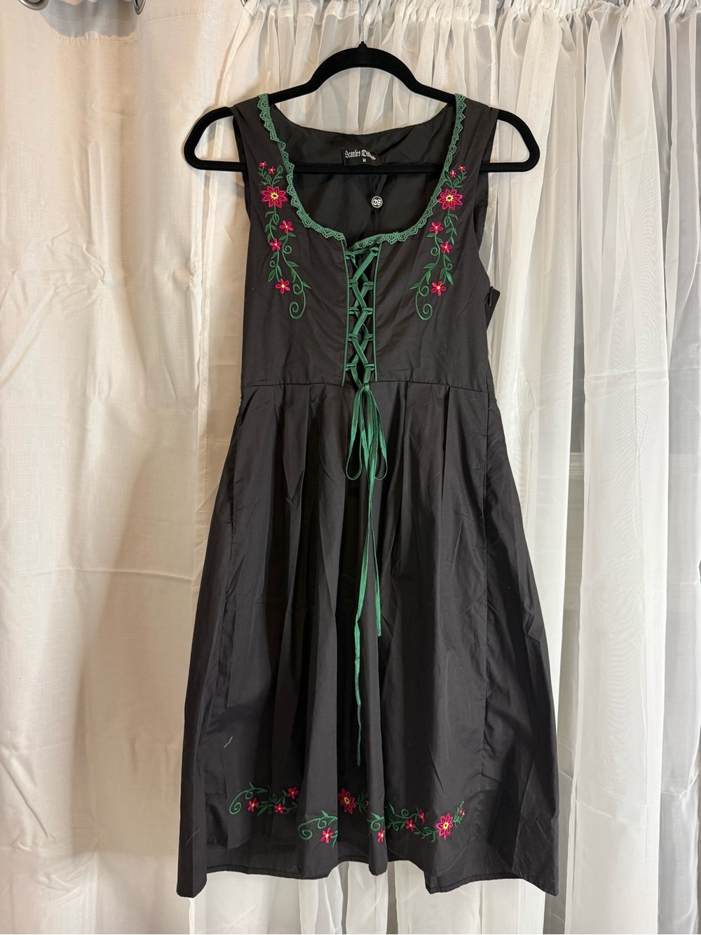 Sleeveless Black Midi Dress with Green Lace-Up and Pink Floral Embroidery